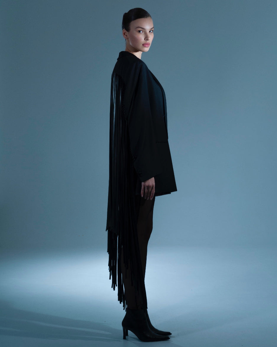 UPCYCLED JACKET WITH FRINGE with a man's shoulder