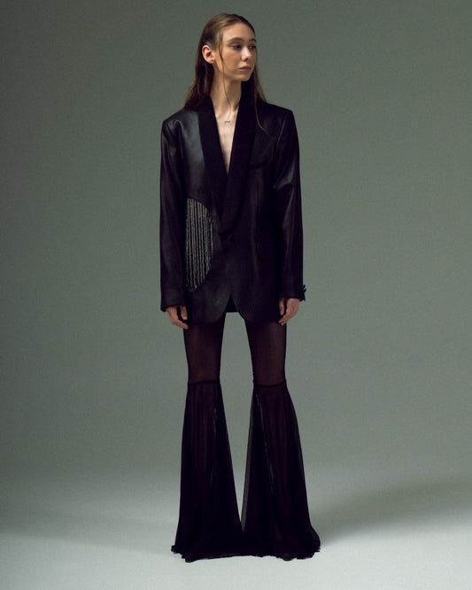 BEADED UPCYCLED JACKET with a man's shoulder